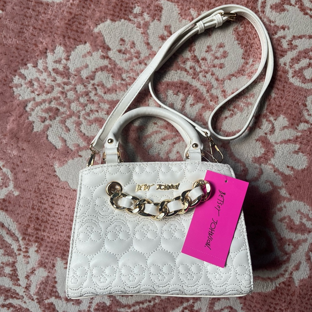 Betsey Johnson white skull purse.
